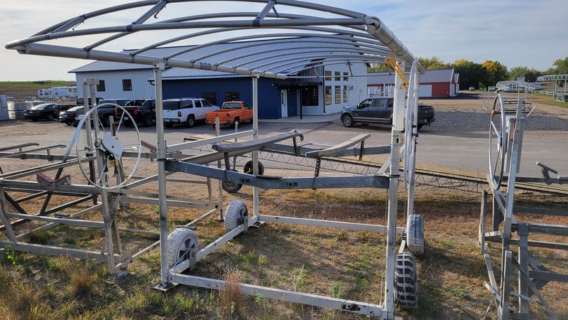 SOLD! ShoreStation 4000lb Vertical Lift with canopy frame and full length bunks. Consignment. Call today!