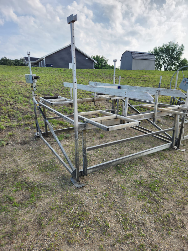 $2500. Cantilever pontoon lift with rails, A/C motor, and brackets for canopy, 