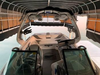 ShoreMaster TowerMaxx Canopy System with surfboat inside with the tower in up position
